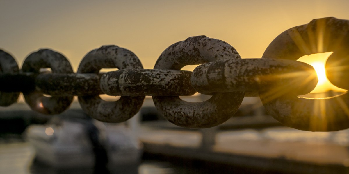chain in front of sun